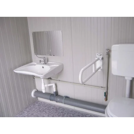 Nouveau module sanitaire PMR avec toilettes et lavabo PMR.