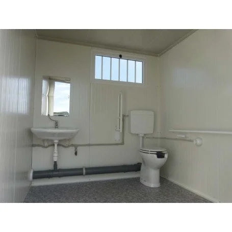 Nouveau module sanitaire PMR avec toilettes et lavabo PMR.
