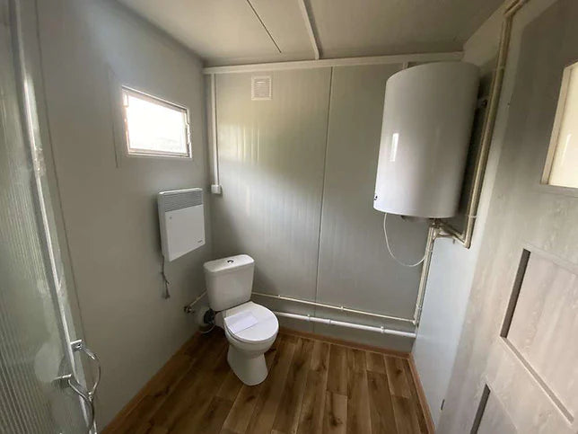 Conteneur 6×2,40 m + WC, douche et cuisine