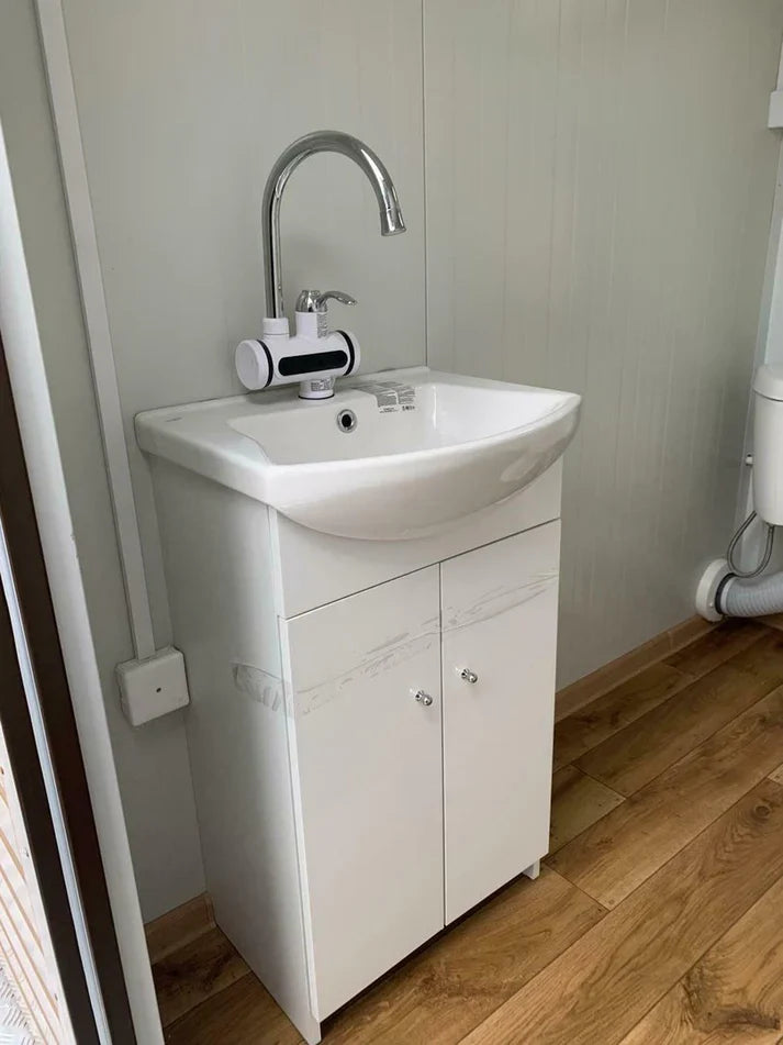 Double conteneur sanitaire avec dépôt de déchets.